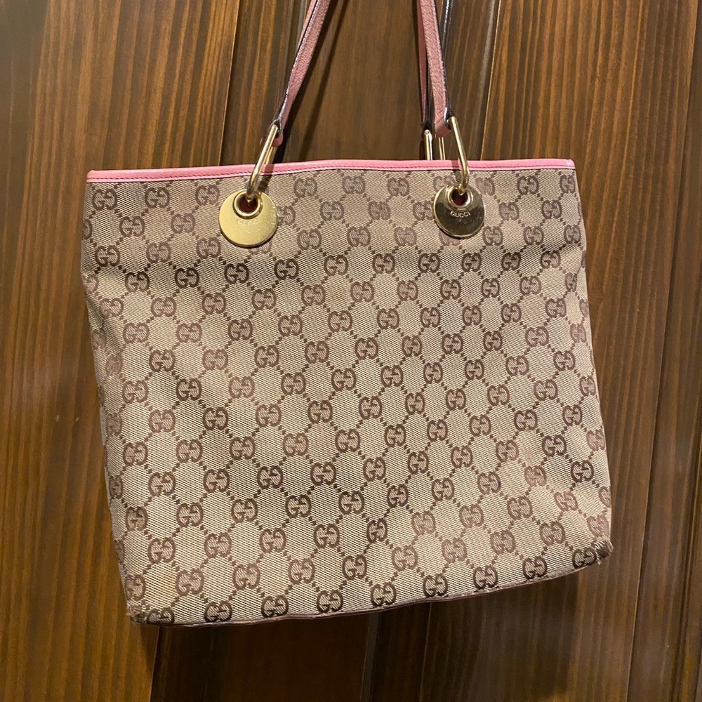 Authentic Gucci canvas bag with pink trim